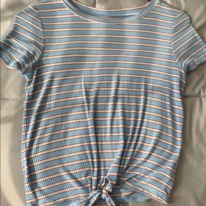 Striped shirt with a tie at the bottom